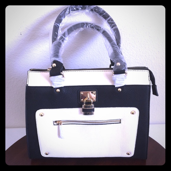 Charming Charlie Handbags - GORGEOUS LARGE BLACK & CREME PURSE!!